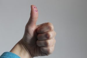 Thumbs up with a smile. Reviews and testimonials.